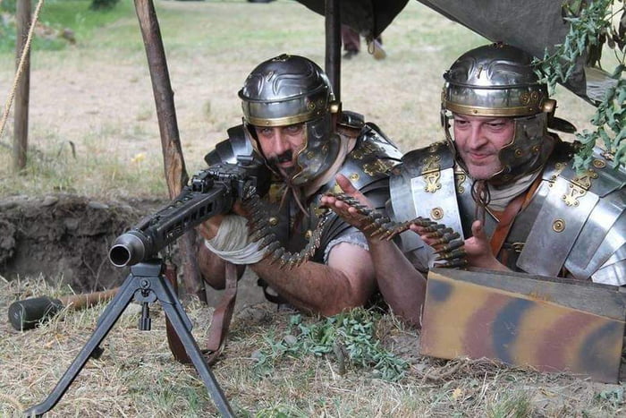 Two roman legionaries defend their position with an MG-42 af