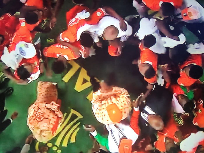 Ivory Coast win the Afcon. Team surrounding their President 