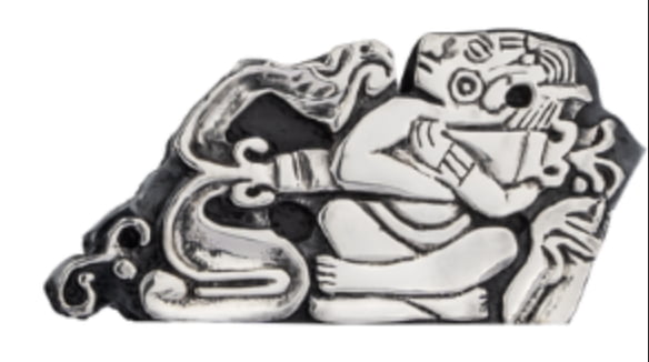 Is this mayan relief showing a man... holding a rocket? Link